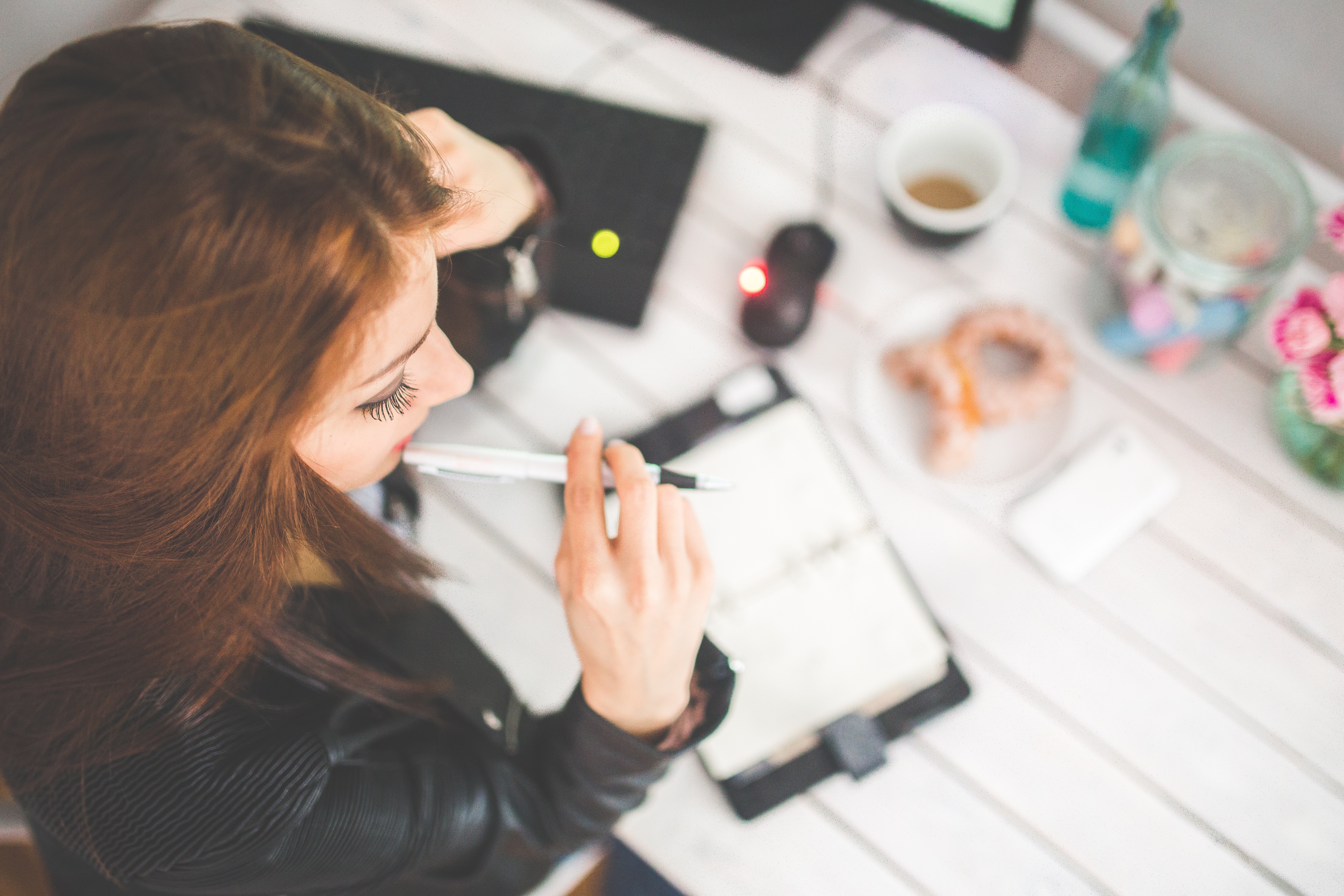 Creator planning an email campaign at a desk