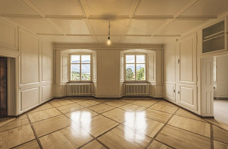 Bright empty room with classic architectural details